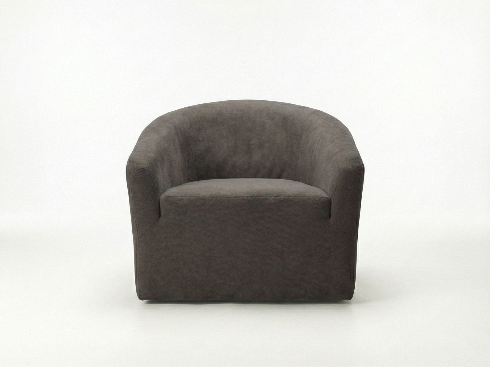 Front view of the Bentley Easy Chair, a fully upholstered tub-style armchair with a deep, curved back and integrated armrests. The chair is covered in dark gray or charcoal fabric, with a smooth, continuous shape, and is sitting on a plain white or light gray floor