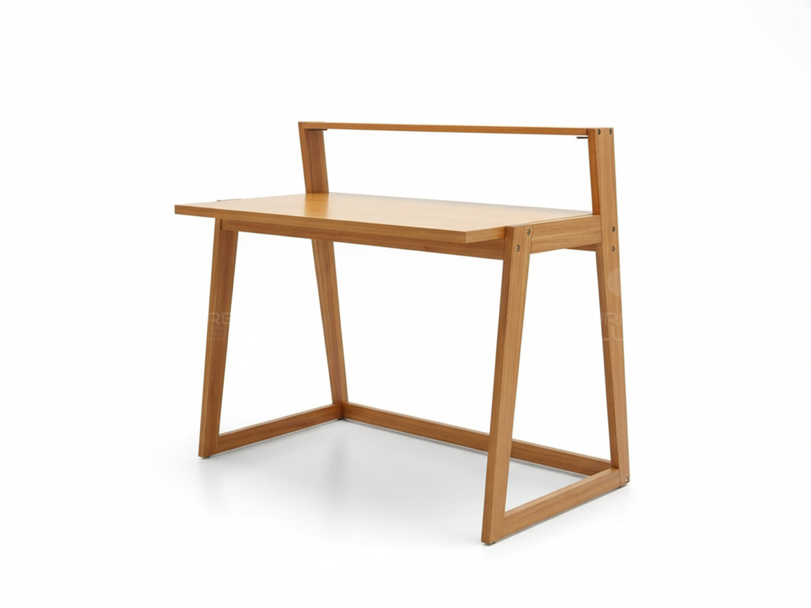 Side view of a modern Coleman writing desk made entirely of light brown Mahogany wood. The desk features a clean, rectangular desktop and a frame with A-shaped sides and a base rail. A thin raised rail or shelf is attached to the back for storage or display