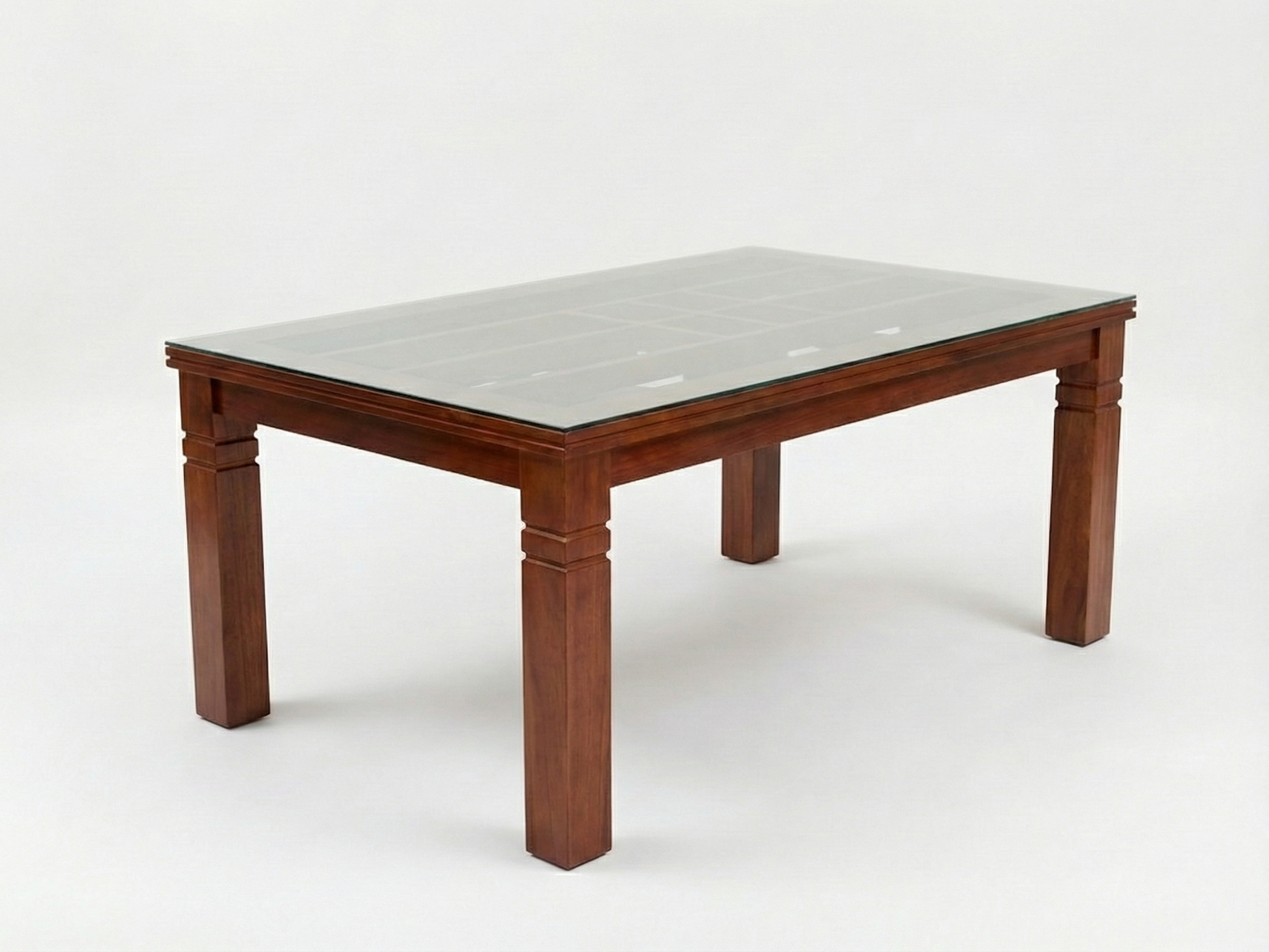 Side view of Dillon Glass top dining table with inserted pockets joined with the frame underneath the glass top