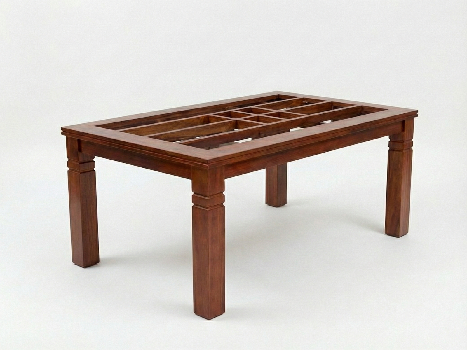 Side view of Dillon Glass top dining table with inserted pockets joined with the frame with glass top removed