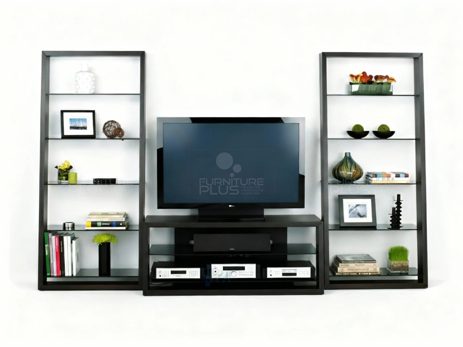 Front view of a Hercules three-piece multimedia entertainment center in a dark brown or black finish. It consists of a central TV stand with open shelving for a television, soundbar, and media components. It is flanked by two tall, narrow, ladder-style bookcases with multiple clear glass shelves, all decorated with books, framed photos, and colorful accessories