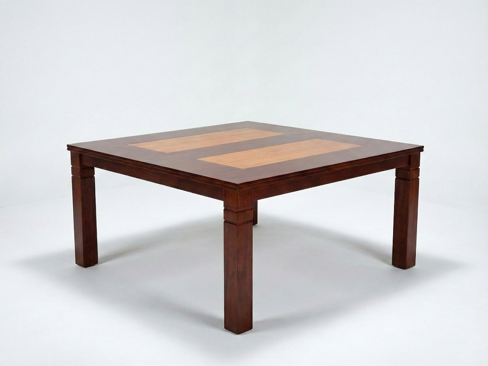 Side view of Jim dining table with lighter color patch on the table top and solid square legs grove pattern made out of Mahogany wood