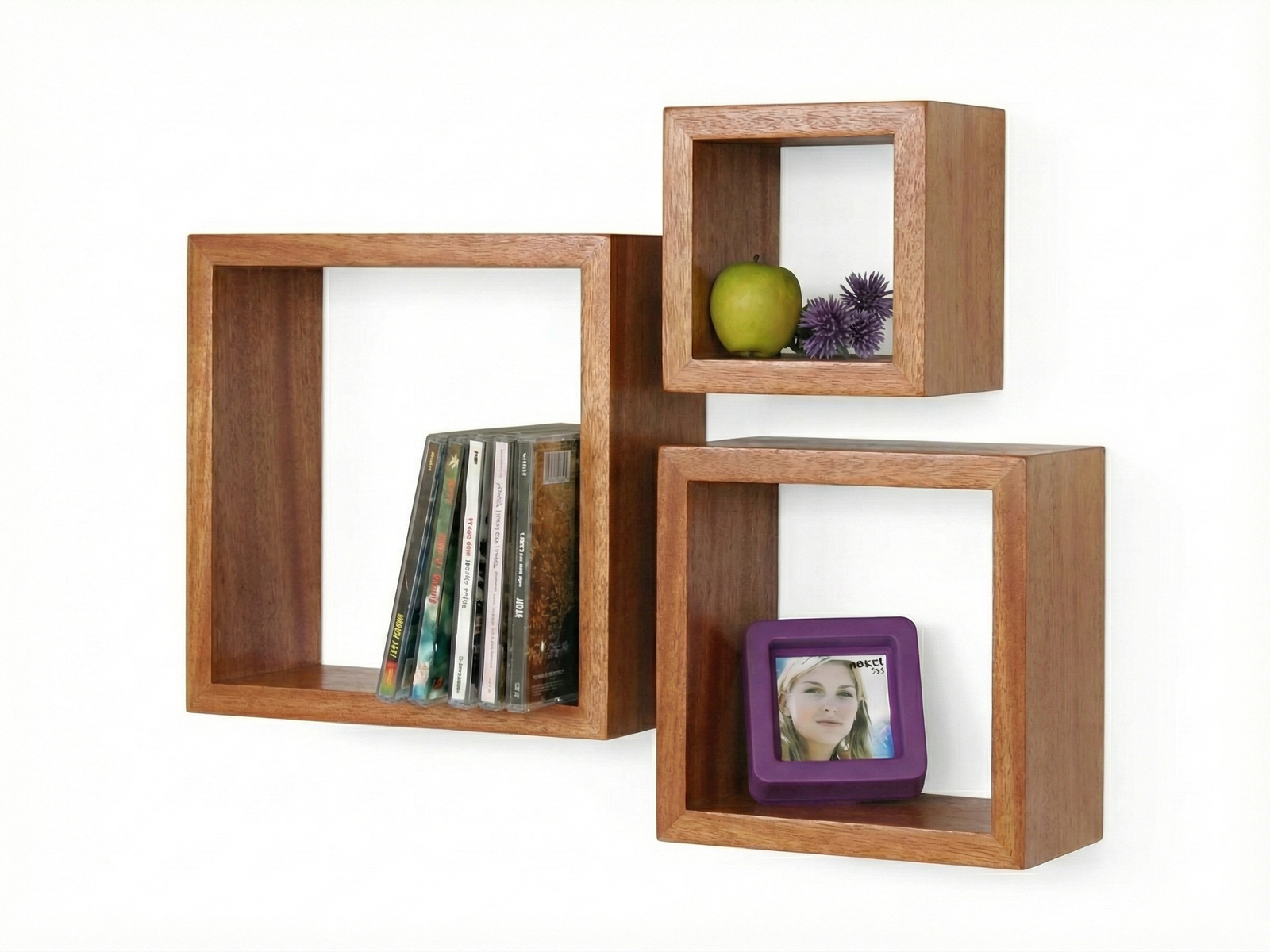 Side view of Borough display rack set of three modern, square, floating wall shelves in a warm brown wood finish, arranged in a cluster