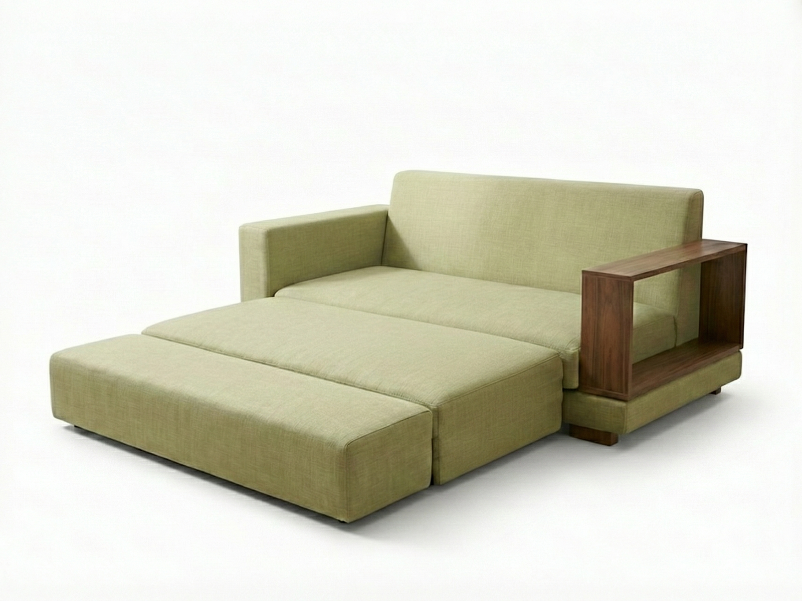 A side view of a modern Sainsbury sofa bed unfolded, isolated on a white background. It has cream upholstery, one thick fabric armrest, and an asymmetrical dark wood armrest on the other side