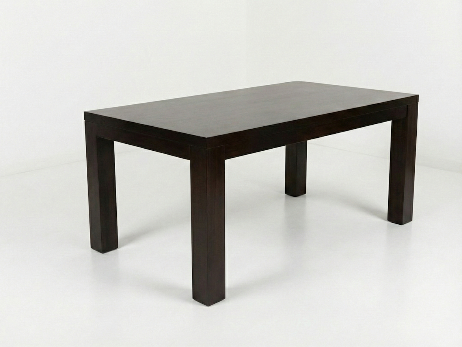Side view of Andrew S1 dining table with solid top joined to chunky, square and clean lined legs